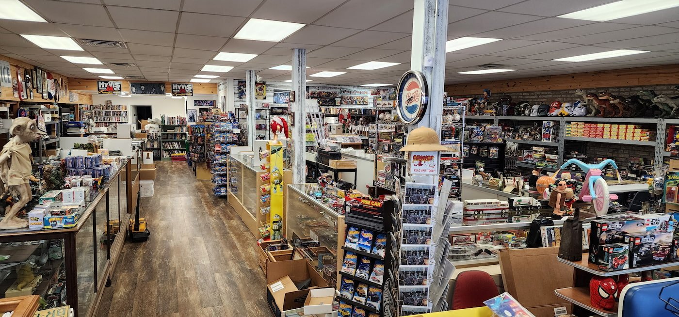 Inside East Carolina Collectibles store in Robersonville NC — showcases, shelves, and comic boxes