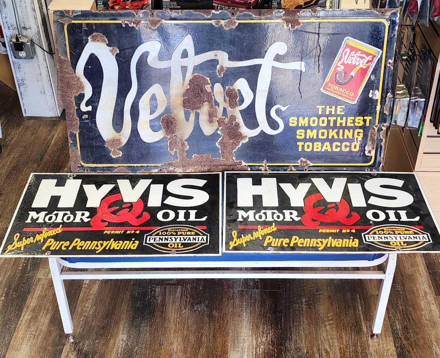 Vintage advertising signs on the walls at East Carolina Collectibles